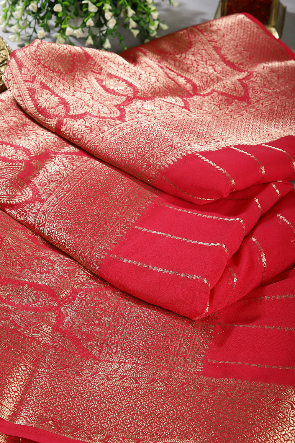 Magneta Color Georgette Saree with Zari Pinstripes