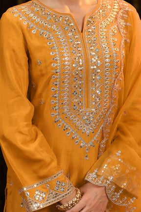 Mustard Color Crepe Silk Embroidered Suit