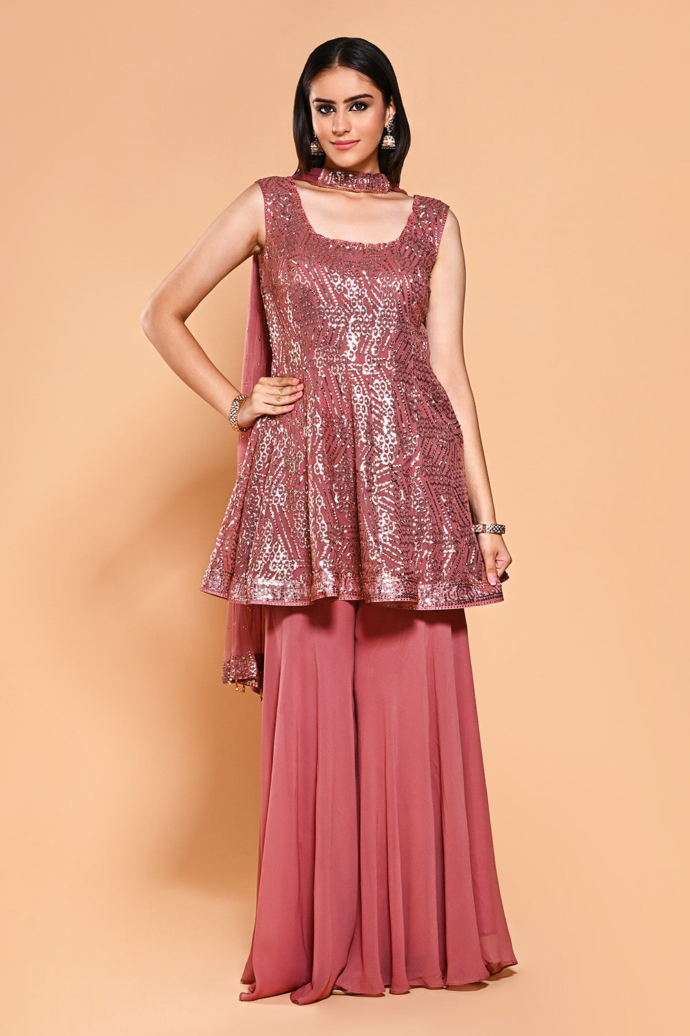 Dusty Pink Color Sequins Embroidered Georgette Peplum Gharara Suit