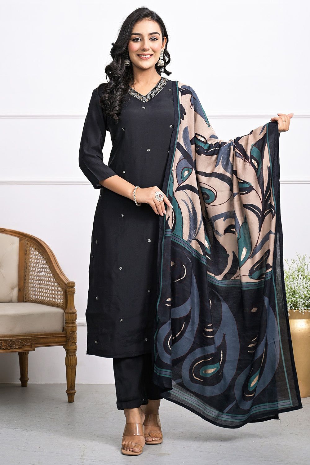 Black Color Muslin Neck Embroidered Straight Suit