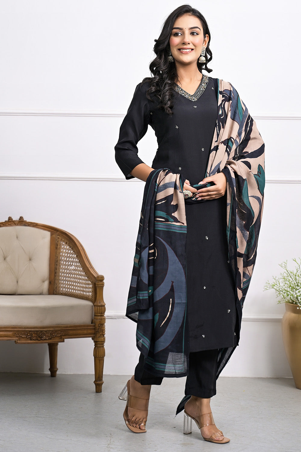 Black Color Muslin Neck Embroidered Straight Suit