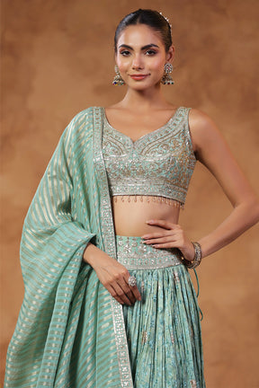 Turquoise Color Tissue Silk Embroidered Lehenga