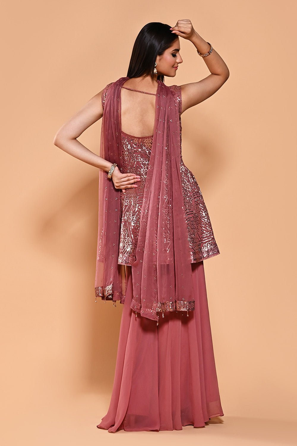 Dusty Pink Color Sequins Embroidered Georgette Peplum Gharara Suit