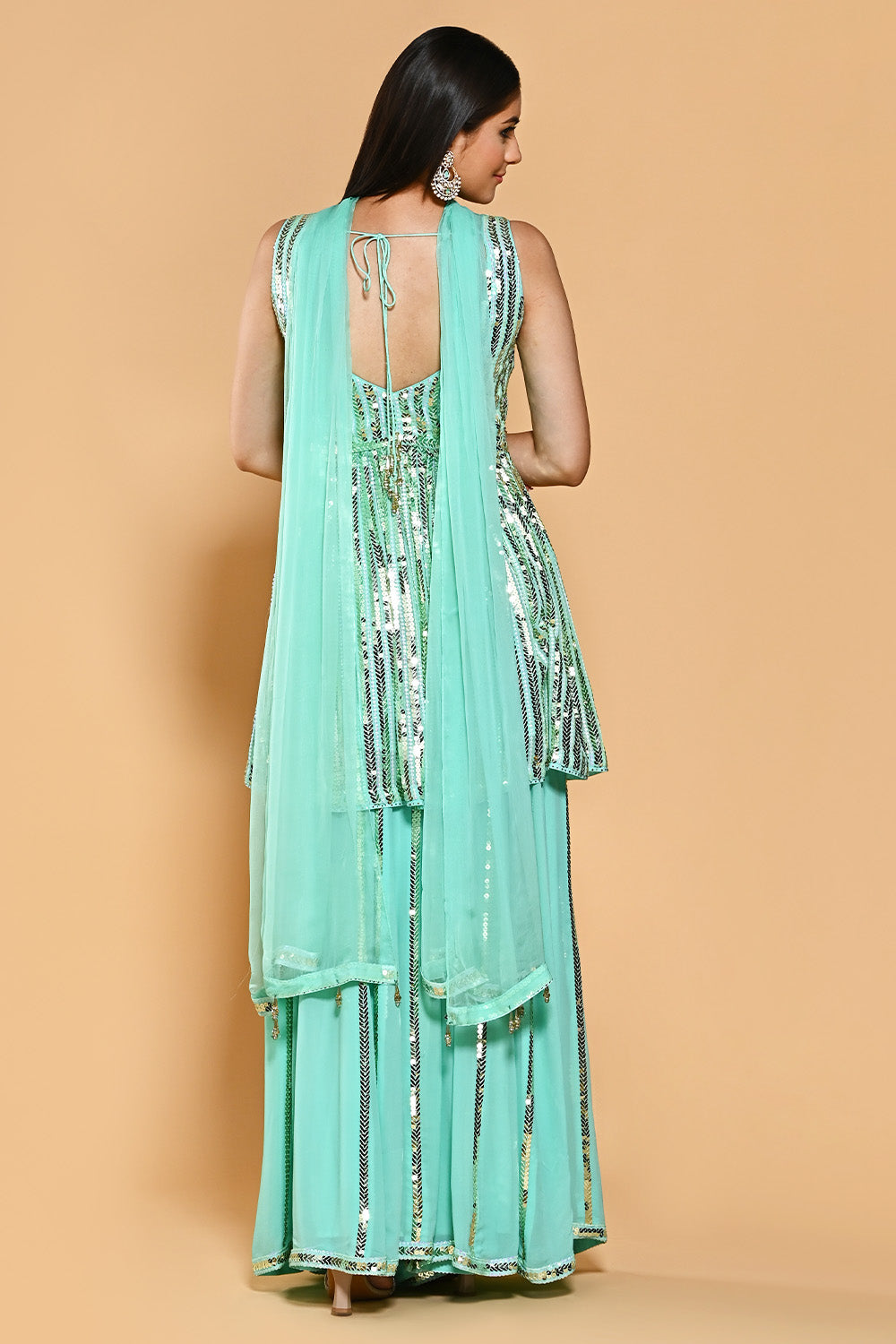 Turquoise Color Sequins Embroidered Georgette Peplum Sharara Suit