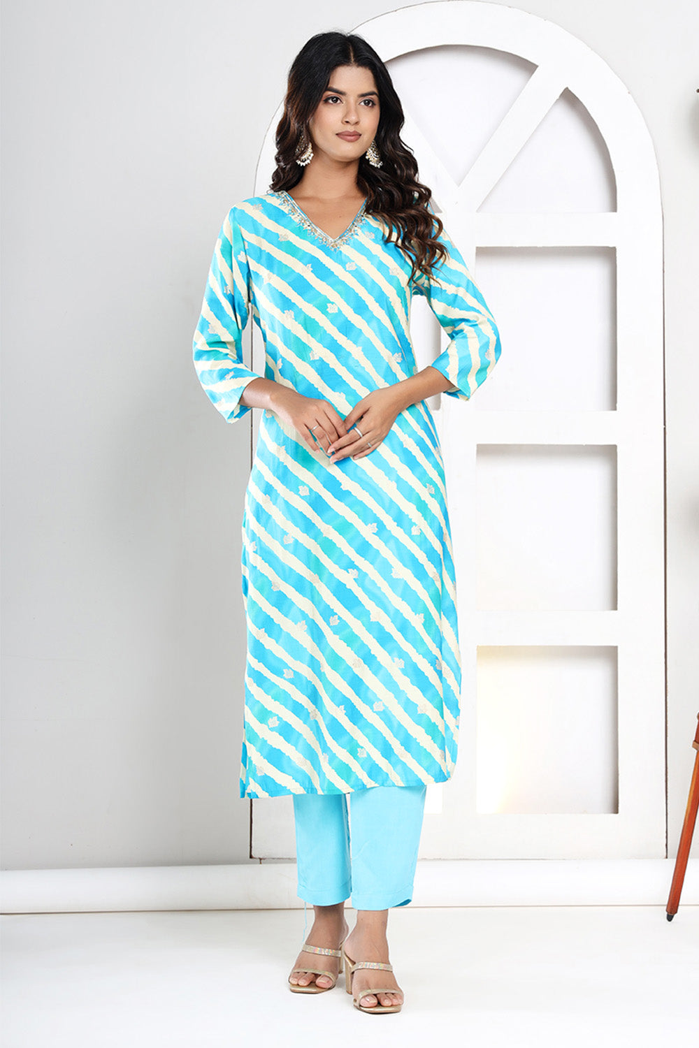 Turquoise & Beige Color Leheria Printed Muslin Suit