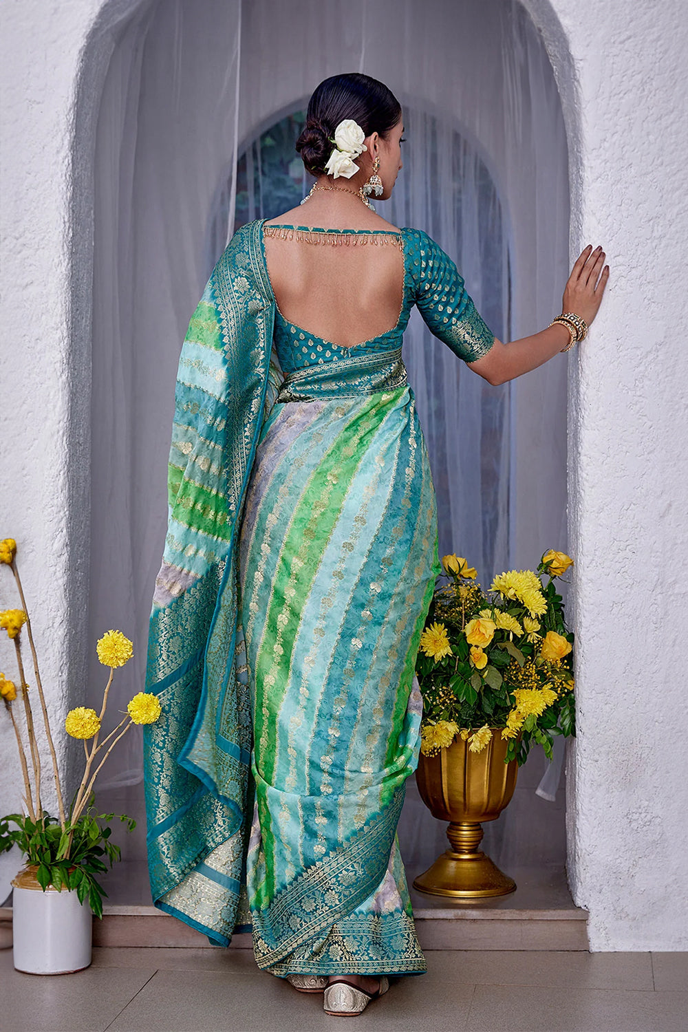 Turquoise Color Khhadi Georgette Woven Saree